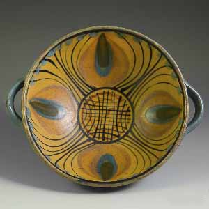 dybdahl medium bowl with two handles, blue-green outside, corn yellow inside with peacock-eye motif
