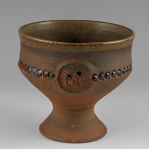 Dybdahl small chalice decorated with a face on rach side.