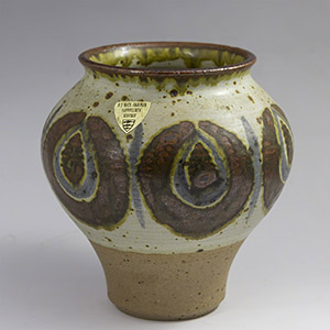 Michael Andersen & Son ceramic ball vase on a raw clay base