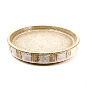 palshus brown and cream colored bowl/tray